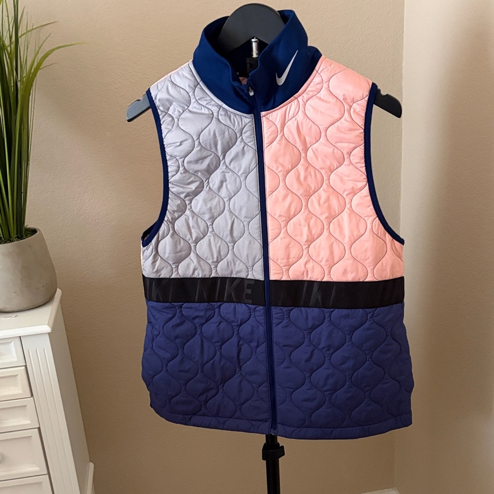 Nike woman’sQuilted Vest - Pink, Gray, and Blue